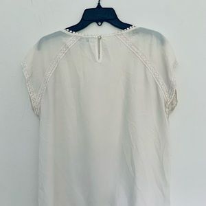 Faith and joy cream blouse with lace detail.